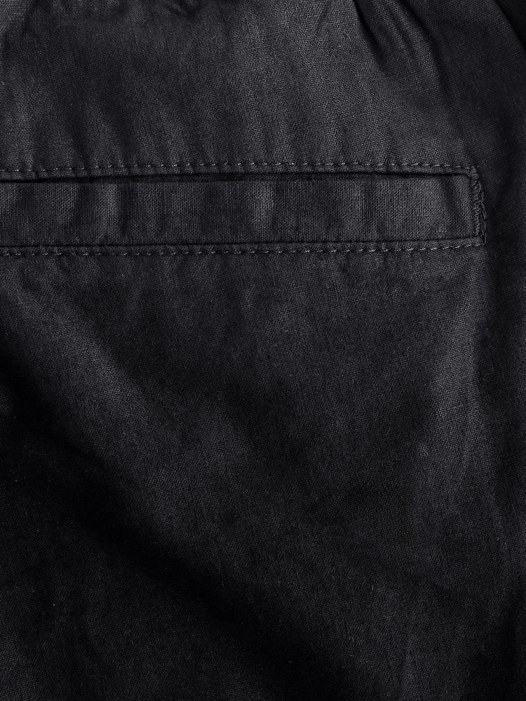 Negro - Corte amplio - Pantalones de lino y algodón con cintura elástica y cordón ajustable - Imagen 12 de 12 Negro - Corte amplio - Pantalones de lino y algodón con cintura elástica y cordón ajustable - Imagen 12 de 12