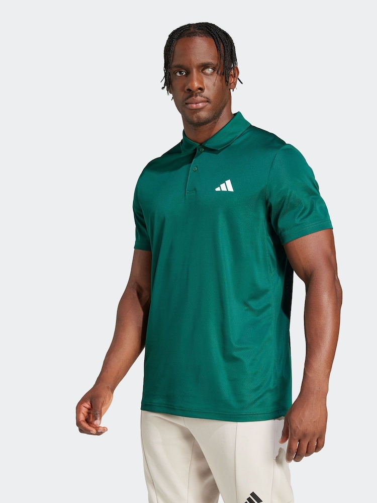 أخضر - قميص بولو رياضي Train Essentials من Adidas - صورة 1 من 6 أخضر - قميص بولو رياضي Train Essentials من Adidas - صورة 1 من 6