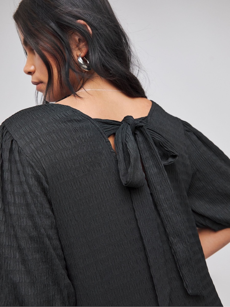 Simply Be Black Textured Jersey Bow Back Asymmetric Maxi Dress - Image 1 of 4