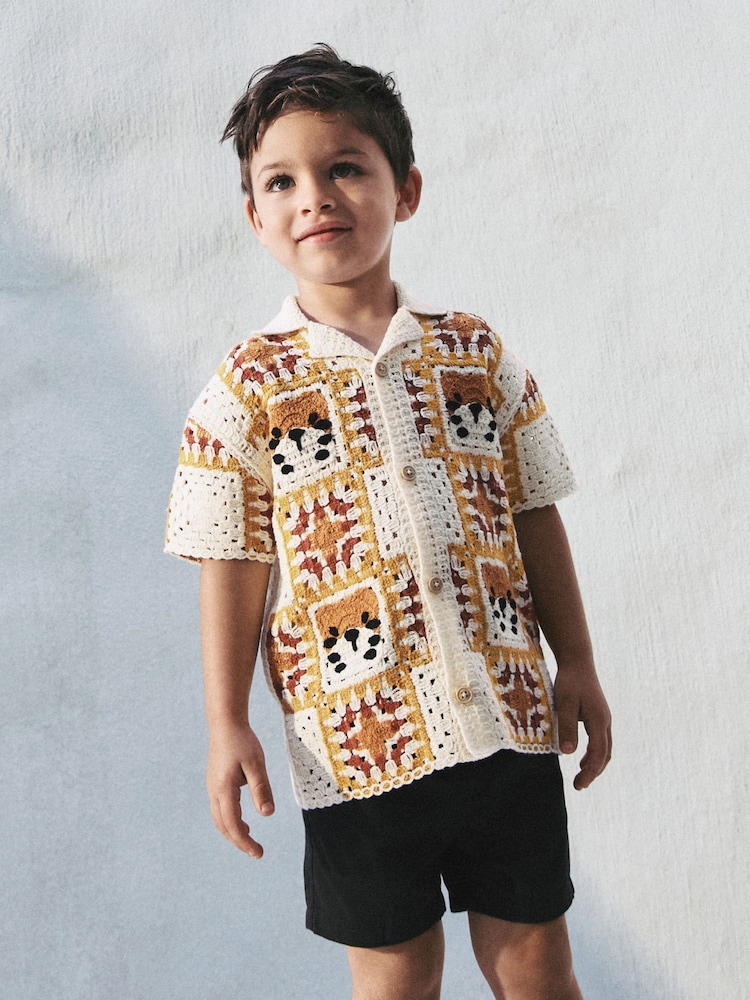 Orange/Neutral Tiger Crochet Revere Collar Short Sleeve Knitted Polo Shirt (3mths-7yrs) - Image 1 of 8 Orange/Neutral Tiger Crochet Revere Collar Short Sleeve Knitted Polo Shirt (3mths-7yrs) - Image 1 of 8