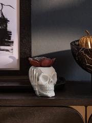 Purple Artificial Succulent In Spooky Halloween Skull - Image 1 of 4