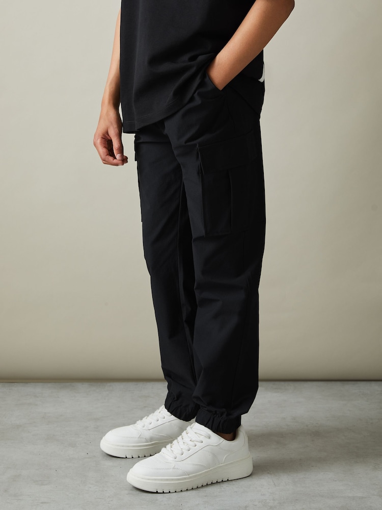 Reiss Black Lucian Technical Drawstring Trousers - Image 1 of 4