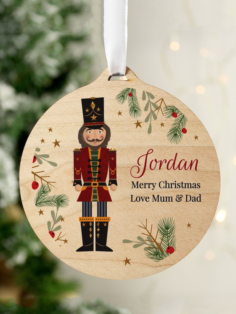 Personalised Christmas Nutcracker Wooden Bauble by PMC - Image 1 of 3
