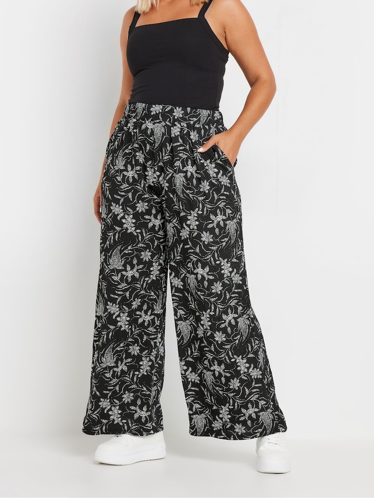 Yours Curve Black Floral Wide Leg Trousers - Image 1 of 5