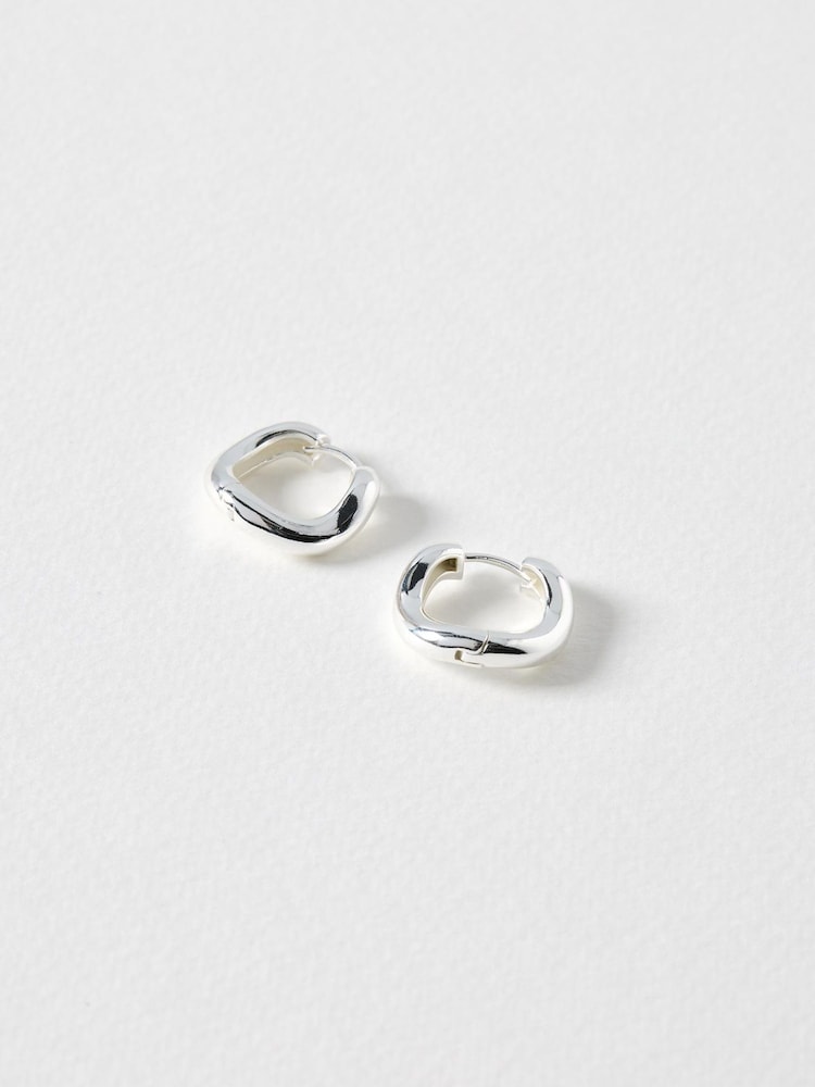 Oliver Bonas Silver Tone Ona Ripple Wave Silver Plated Clicker Hoop Large Earrings - Image 1 of 3 Oliver Bonas Silver Tone Ona Ripple Wave Silver Plated Clicker Hoop Large Earrings - Image 1 of 3