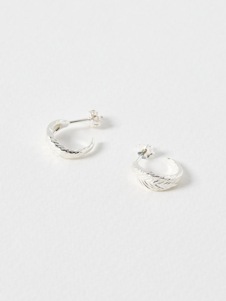 Oliver Bonas Silver Tone Raven Feather Texture Hoop Earrings - Image 1 of 4