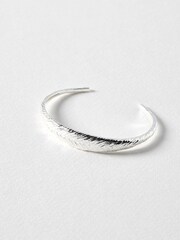 Oliver Bonas Silver Raven Feather Texture Silver Plated Bangle - Image 1 of 3