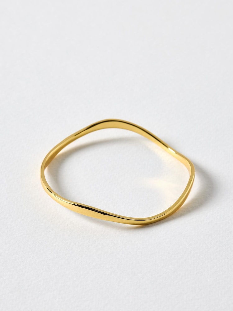 Oliver Bonas Gold Tone Naia Ripple Wave Bangle - Image 2 of 3 Oliver Bonas Gold Tone Naia Ripple Wave Bangle - Image 2 of 3