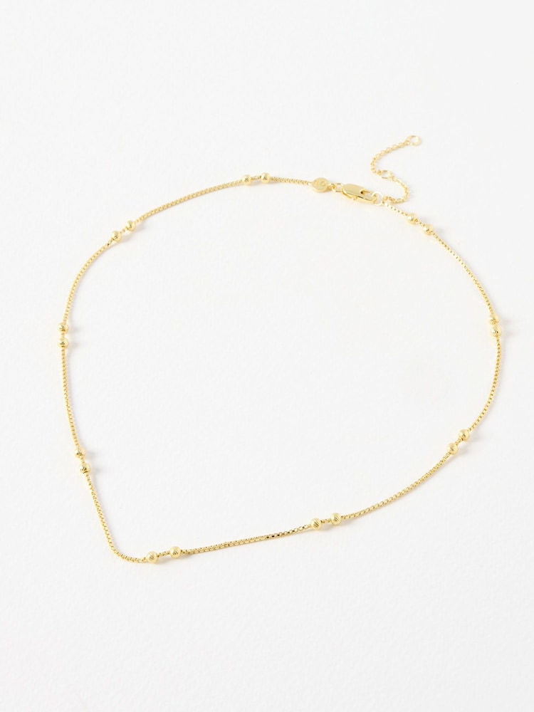 Oliver Bonas Gold Tone Brielle Box & Bead Detail Chain Necklace - Image 1 of 4 Oliver Bonas Gold Tone Brielle Box & Bead Detail Chain Necklace - Image 1 of 4