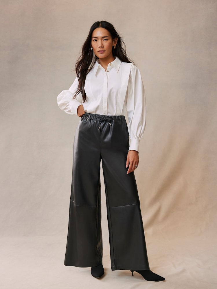 Mint Velvet Black Faux Leather Wide Leg Trousers - Image 1 of 4 Mint Velvet Black Faux Leather Wide Leg Trousers - Image 1 of 4
