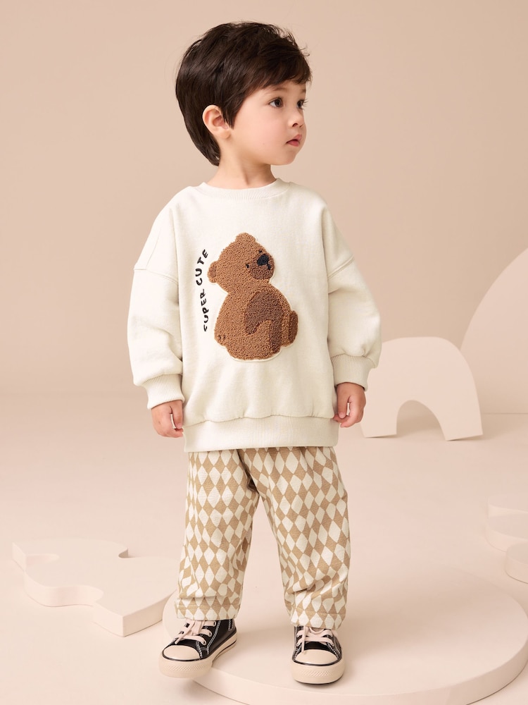 Tan Brown/White Bear - Set mit Jersey-Sweatshirt und Jogginghose (3 Monate bis 7 Jahre) - Bild 1 von 8 Tan Brown/White Bear - Set mit Jersey-Sweatshirt und Jogginghose (3 Monate bis 7 Jahre) - Bild 1 von 8