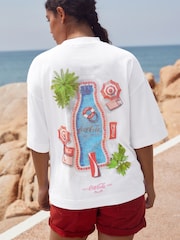 Ecru White Pool Scene Cotton Official Coca Cola Licence Graphic Short Sleeve Crew Neck T-Shirt - Image 1 of 8