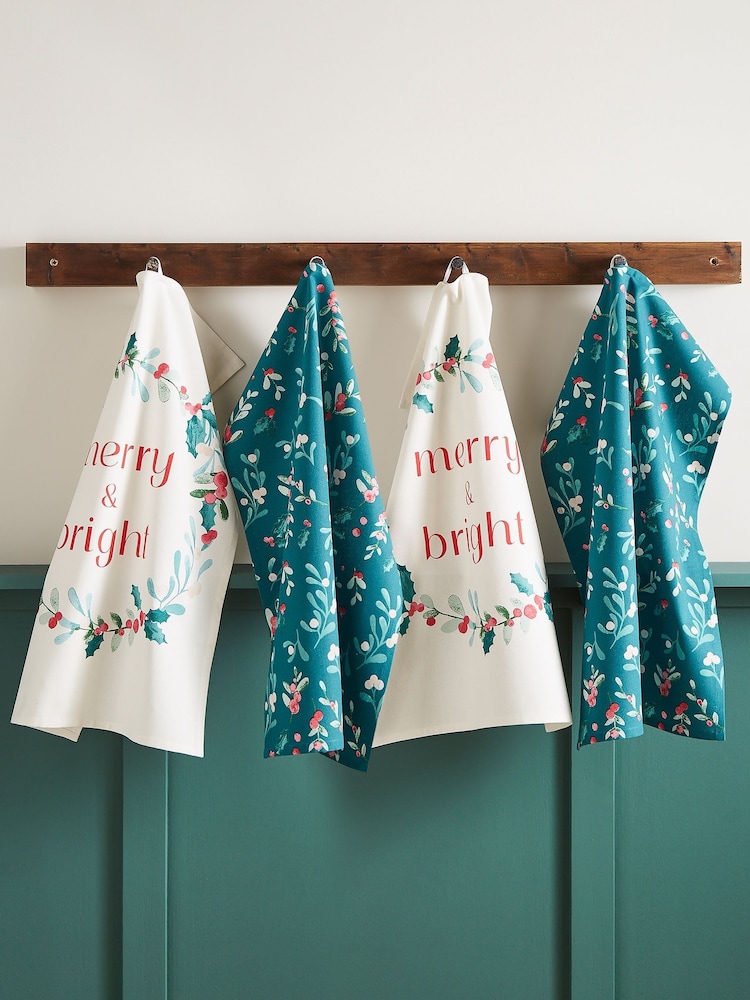 Catherine Lansfield 4 Pack Green Christmas Holly & Mistletoe 100% Cotton Tea Towels - Image 1 of 2 Catherine Lansfield 4 Pack Green Christmas Holly & Mistletoe 100% Cotton Tea Towels - Image 1 of 2