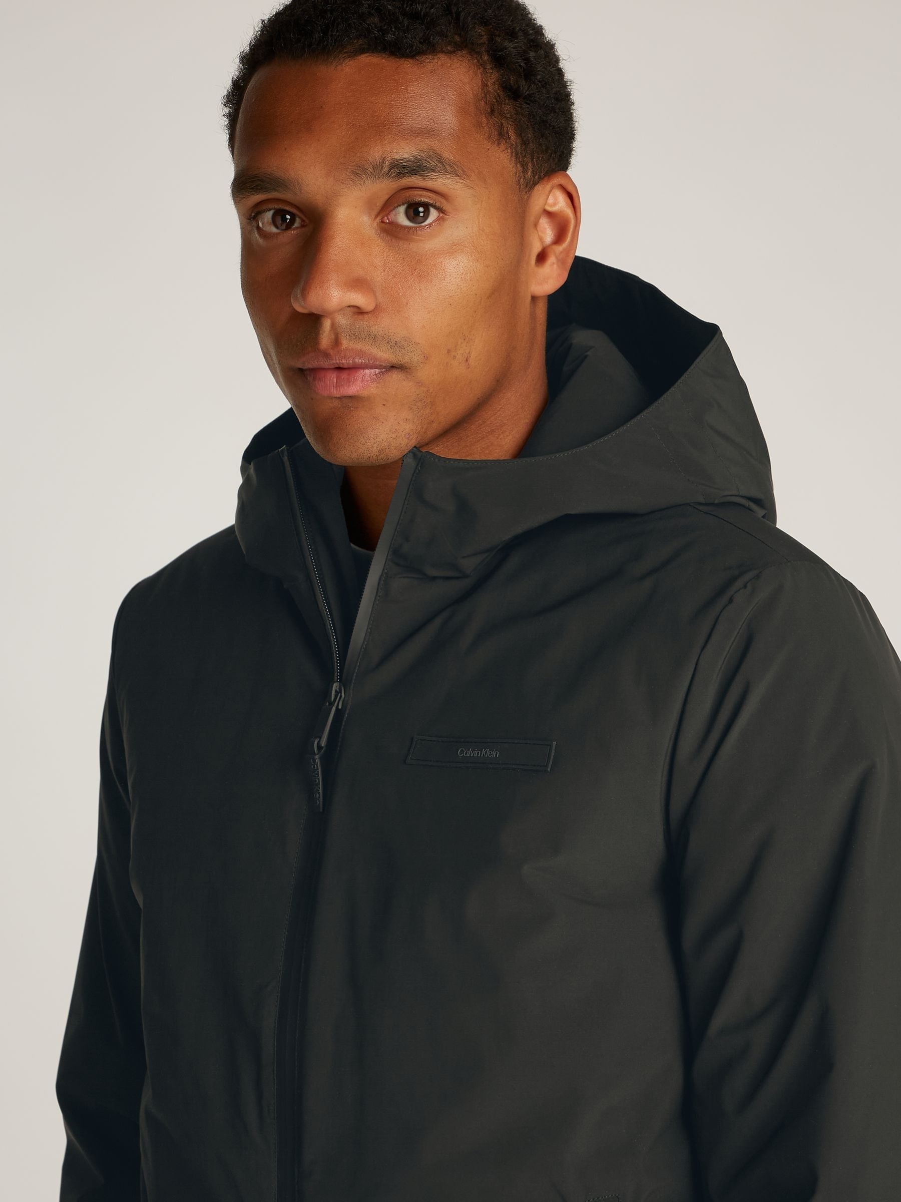Przeglądaj Calvin Klein Technical Hooded Jacket from Next Poland