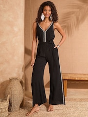 Love & Roses Black Sequin Trim V-Neck Belted Jumpsuit - Image 1 of 4