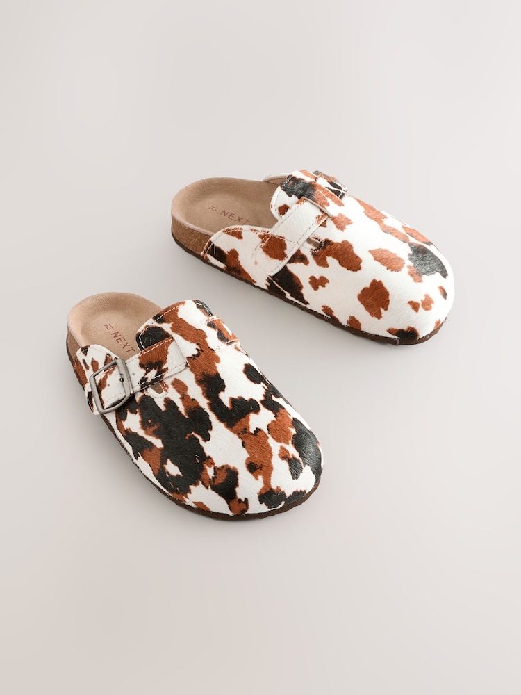 Cow Print Leather Slip-Ons Clogs - Image 1 of 5