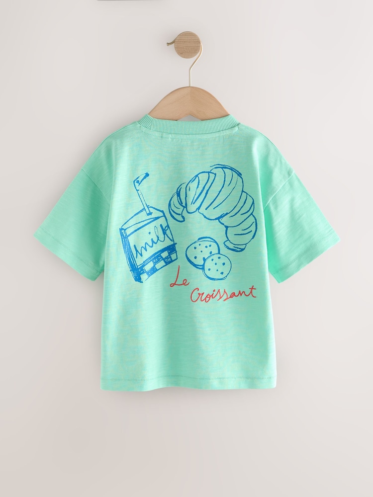 Blau, Croissant - Kurzärmeliges T-Shirt mit Rückendruck (3M.–7J.) - Bild 2 von 4 Blau, Croissant - Kurzärmeliges T-Shirt mit Rückendruck (3M.–7J.) - Bild 2 von 4