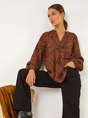 Roman Orange Animal Print Buttoned Pinktuck Top - Image 1 of 6