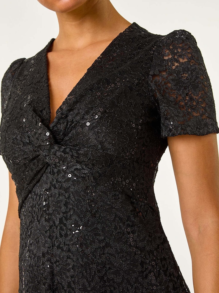 Schwarz - Roman Midikleid mit Pailletten-Spitze und verdrehter Vorderseite - Bild 5 von 5 Schwarz - Roman Midikleid mit Pailletten-Spitze und verdrehter Vorderseite - Bild 5 von 5