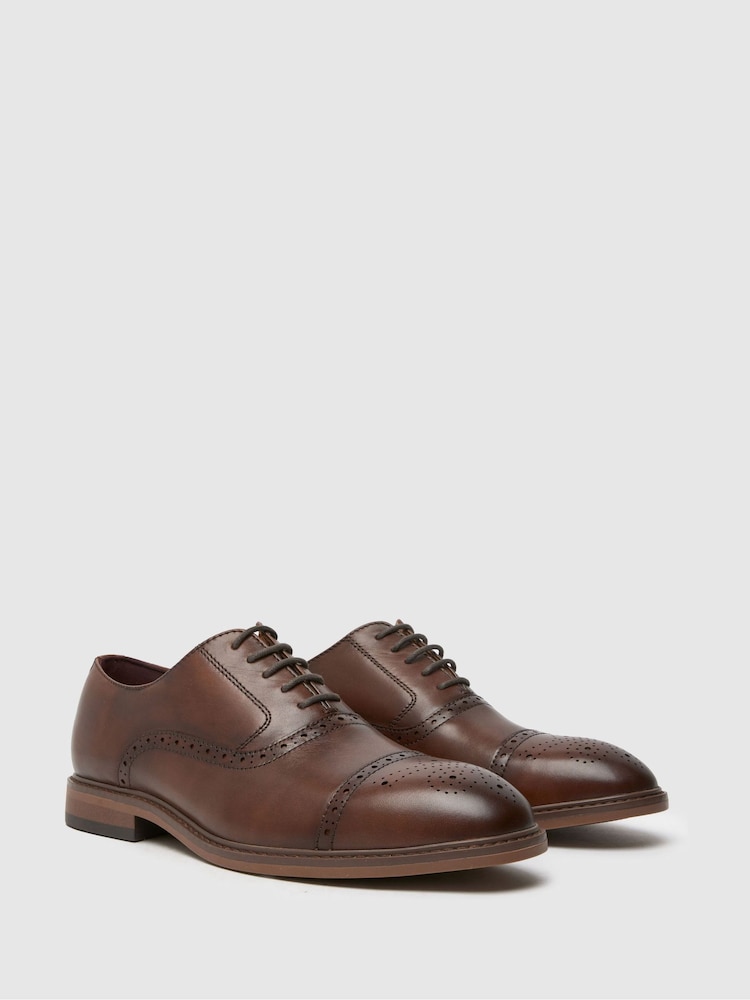 Schuh Raven Leather Brown gležnjar z luknjičastim vzorcem in vezalkami - Slika 2 iz 4 Schuh Raven Leather Brown gležnjar z luknjičastim vzorcem in vezalkami - Slika 2 iz 4