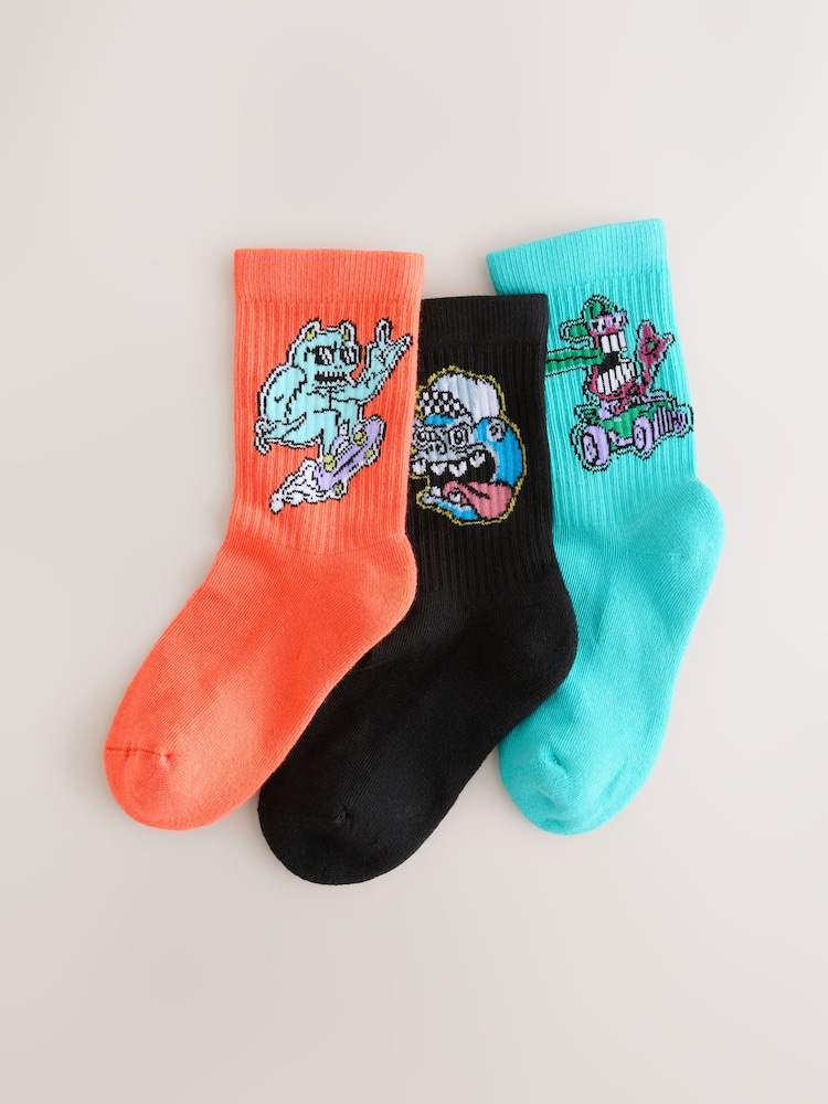 Diseño de monstruo en negro/naranja/verde azulado - Pack de 3 calcetines de alto contenido en algodón con diseño ribeteado de canalé y plantilla acolchada - Imagen 1 de 3 Diseño de monstruo en negro/naranja/verde azulado - Pack de 3 calcetines de alto contenido en algodón con diseño ribeteado de canalé y plantilla acolchada - Imagen 1 de 3