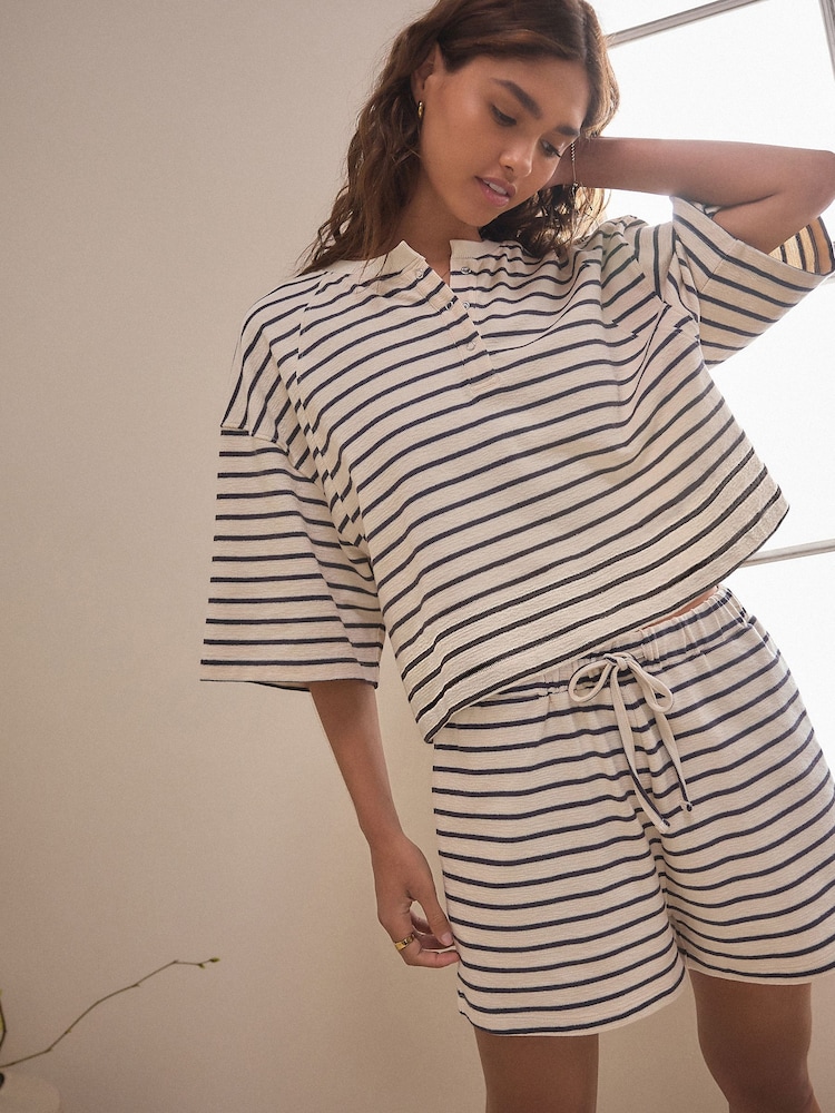 Schwarz/Weiß - Kurzes strukturiertes Pyjama-Set aus 100 % Baumwolle - Bild 1 von 10 Schwarz/Weiß - Kurzes strukturiertes Pyjama-Set aus 100 % Baumwolle - Bild 1 von 10