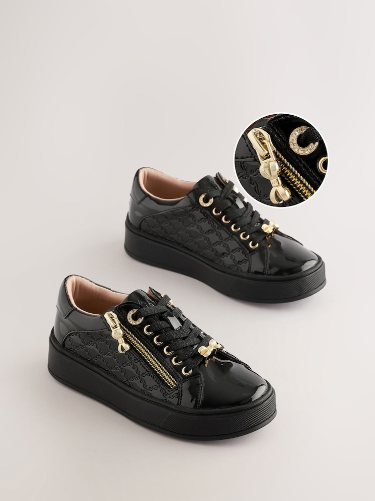 Baker by Ted Baker Girls School Patent Black Trainers with Bow Charm - Bild 1 von 6 Baker by Ted Baker Girls School Patent Black Trainers with Bow Charm - Bild 1 von 6