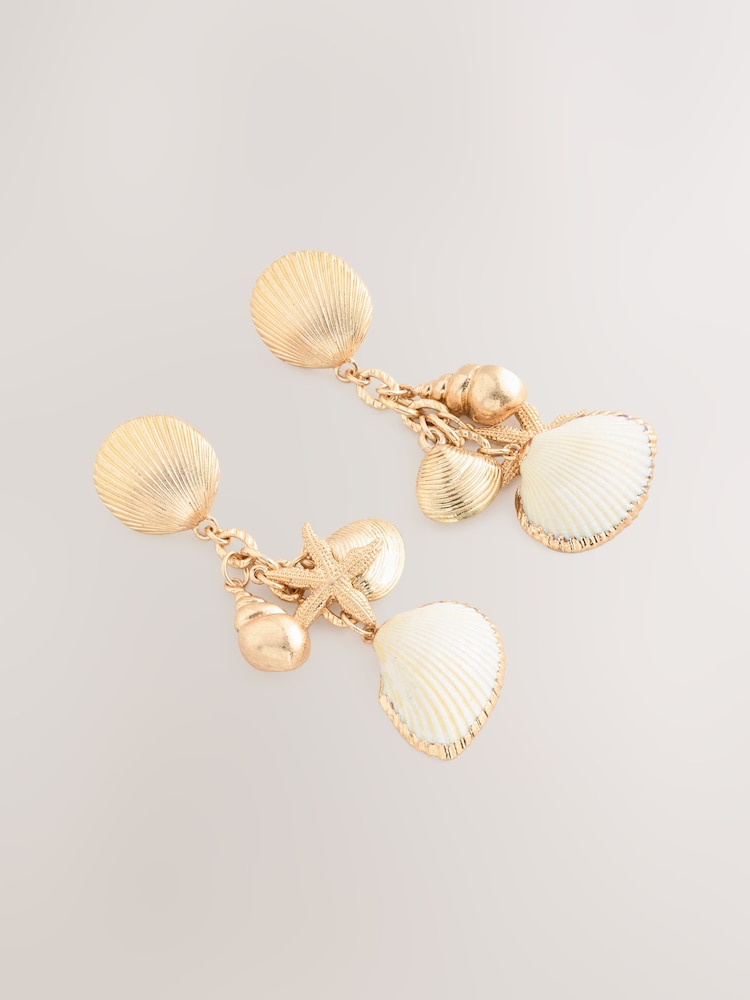 Tono dorado - Pendientes largos con conchas - Imagen 1 de 3 Tono dorado - Pendientes largos con conchas - Imagen 1 de 3