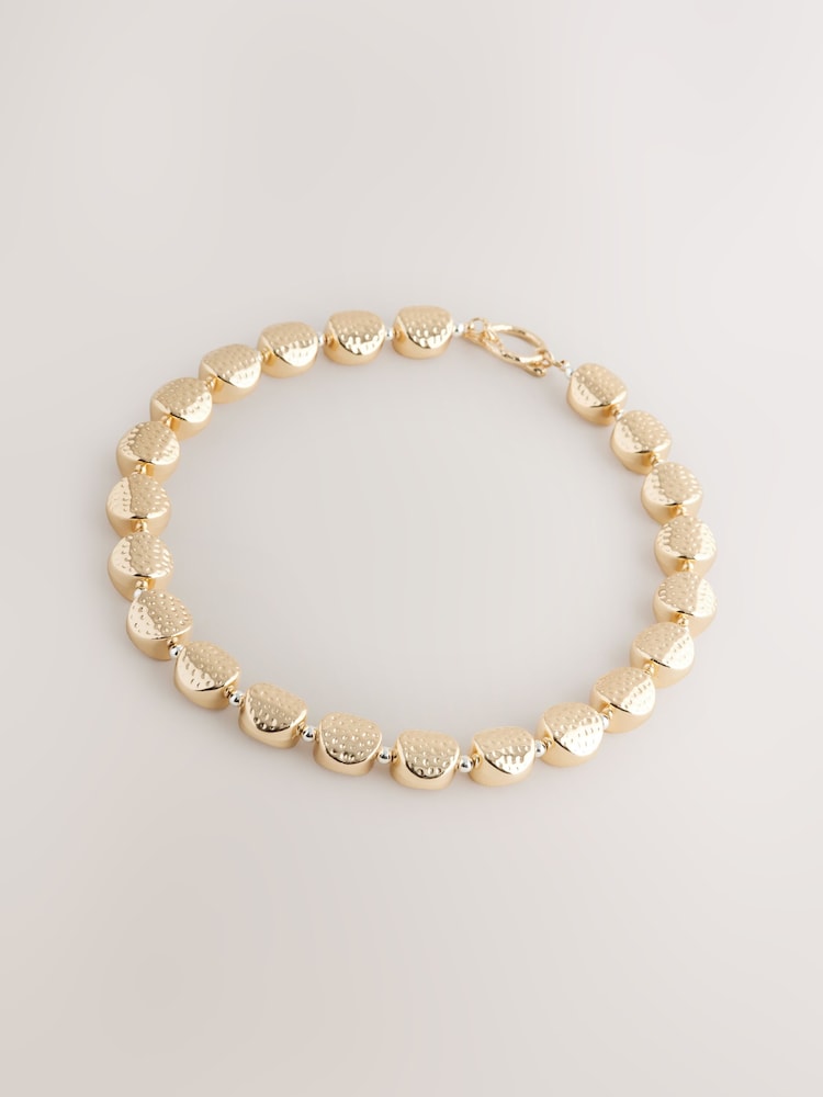 Gold Tone Chunky Hammered Necklace - Image 1 of 3 Gold Tone Chunky Hammered Necklace - Image 1 of 3