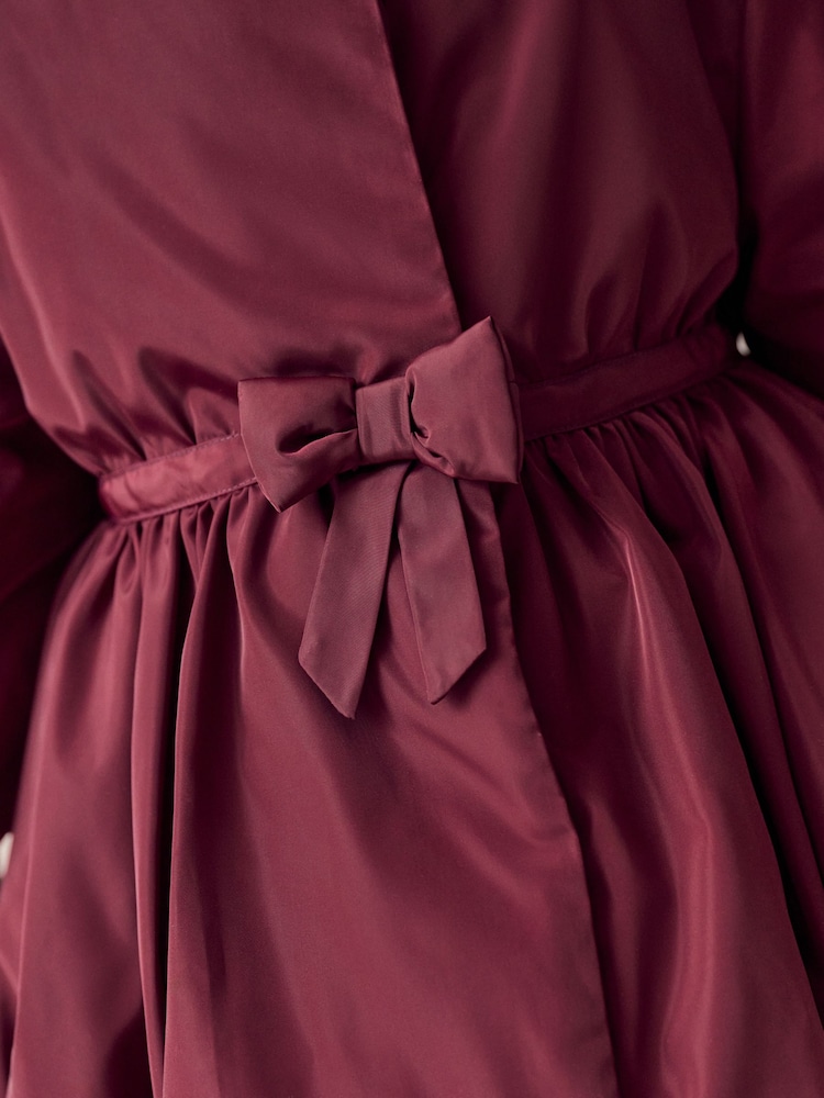 Burgundy Red Shower Resistant Skirted Coat With Bow Detail (3mths-7yrs) - Image 12 of 12 Burgundy Red Shower Resistant Skirted Coat With Bow Detail (3mths-7yrs) - Image 12 of 12