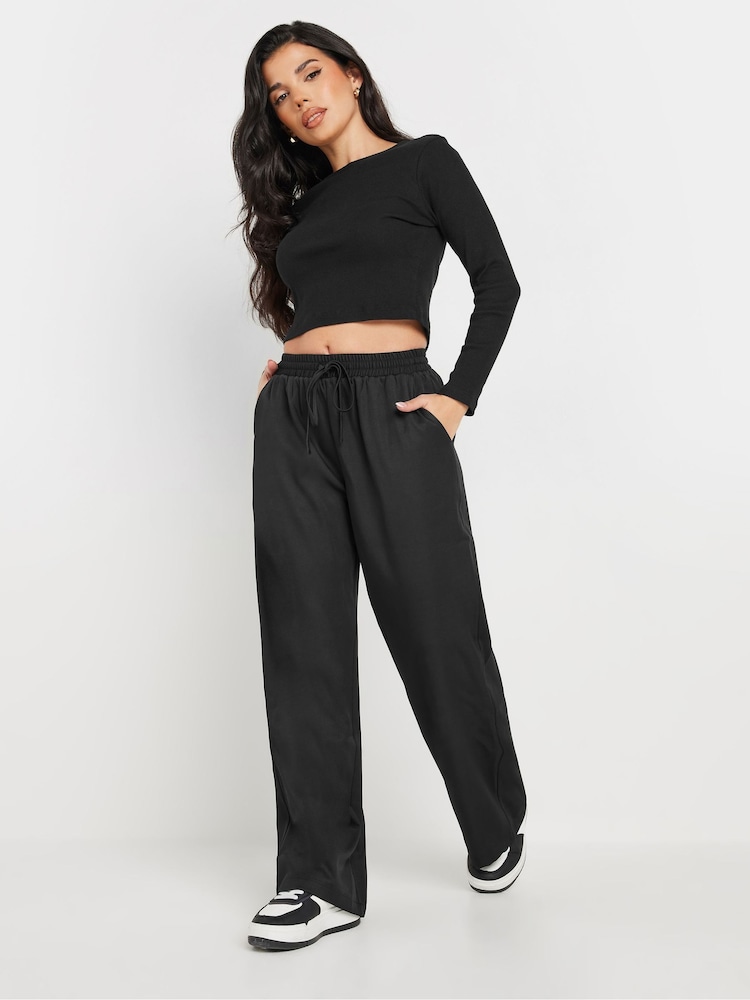 PixieGirl Petite Black Tie Waist Wide Leg Trousers - Image 1 of 5 PixieGirl Petite Black Tie Waist Wide Leg Trousers - Image 1 of 5