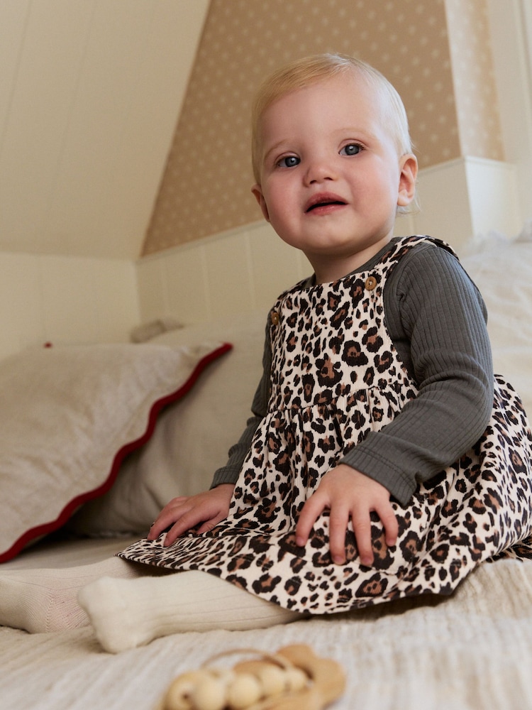 Leopardenmuster, Anthrazit - Baby Langarm-Schürzen-Body und Strumpfhose im Set aus Cord (0 Monate bis 2 Jahre) - Bild 1 von 15