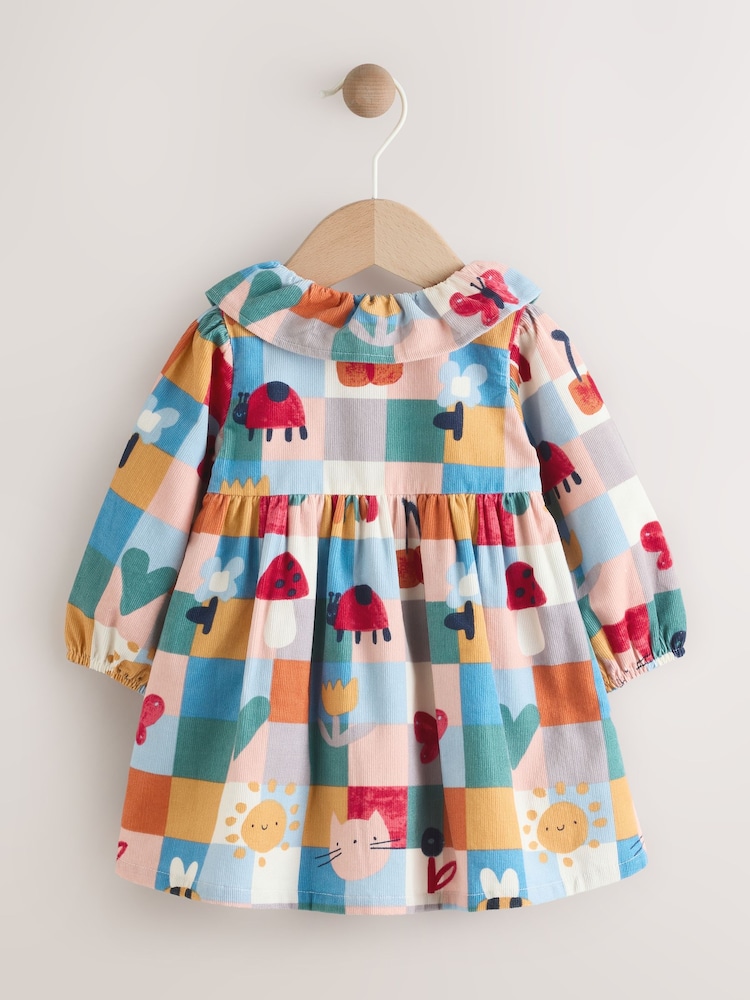 Red/Blue Character Check - Baby Cord Dress with Tights 2 Piece Set (0mths-2yrs) - Imagen 2 de 7 Red/Blue Character Check - Baby Cord Dress with Tights 2 Piece Set (0mths-2yrs) - Imagen 2 de 7