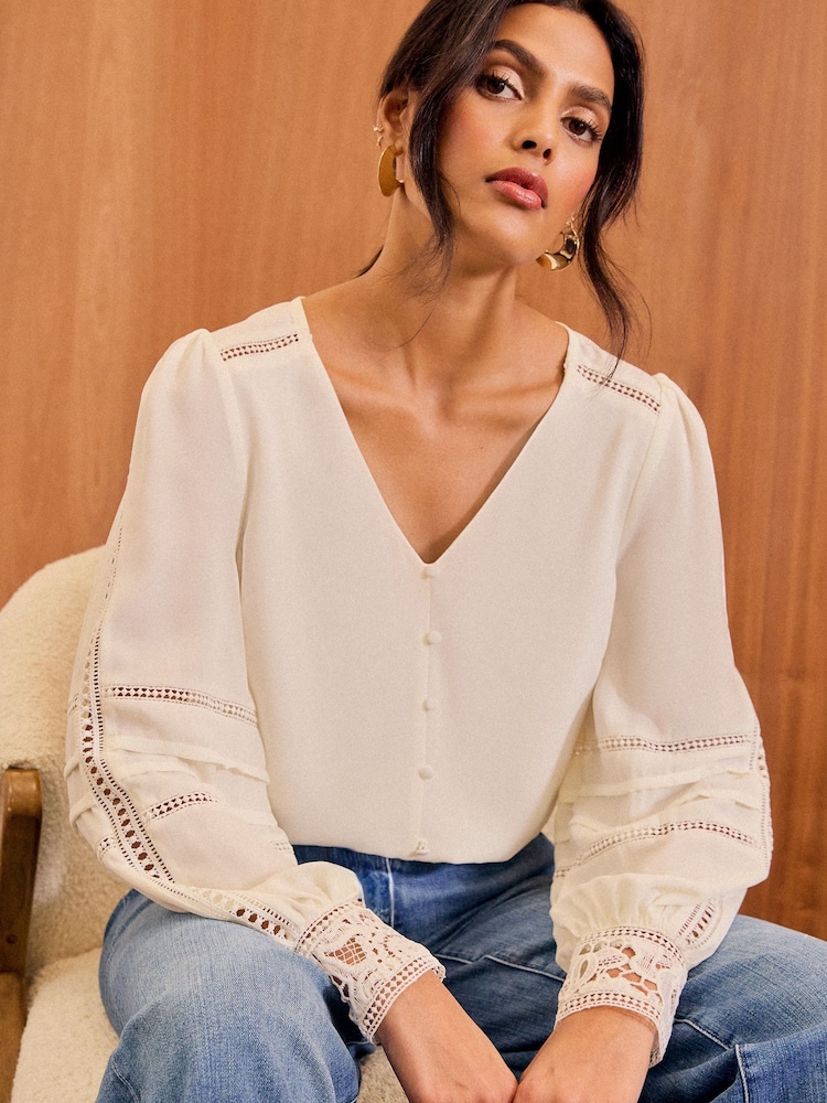 Love & Roses White Lace Cuff V-Neck Blouse - Image 1 of 4