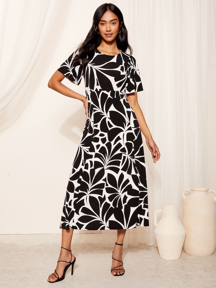 Friends Like These Black ITY Flutter Short Sleeve Midi Dress - Image 1 of 4