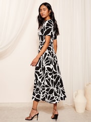Friends Like These Black ITY Flutter Short Sleeve Midi Dress - Image 4 of 4