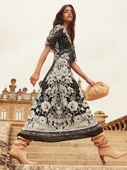 Lipsy Black/White Petite Flutter Sleeve Polka Dot Floral Chiffon Midi Dress - Image 1 of 4