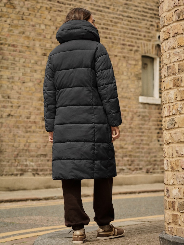 shower resistant black longline padded puffer coat