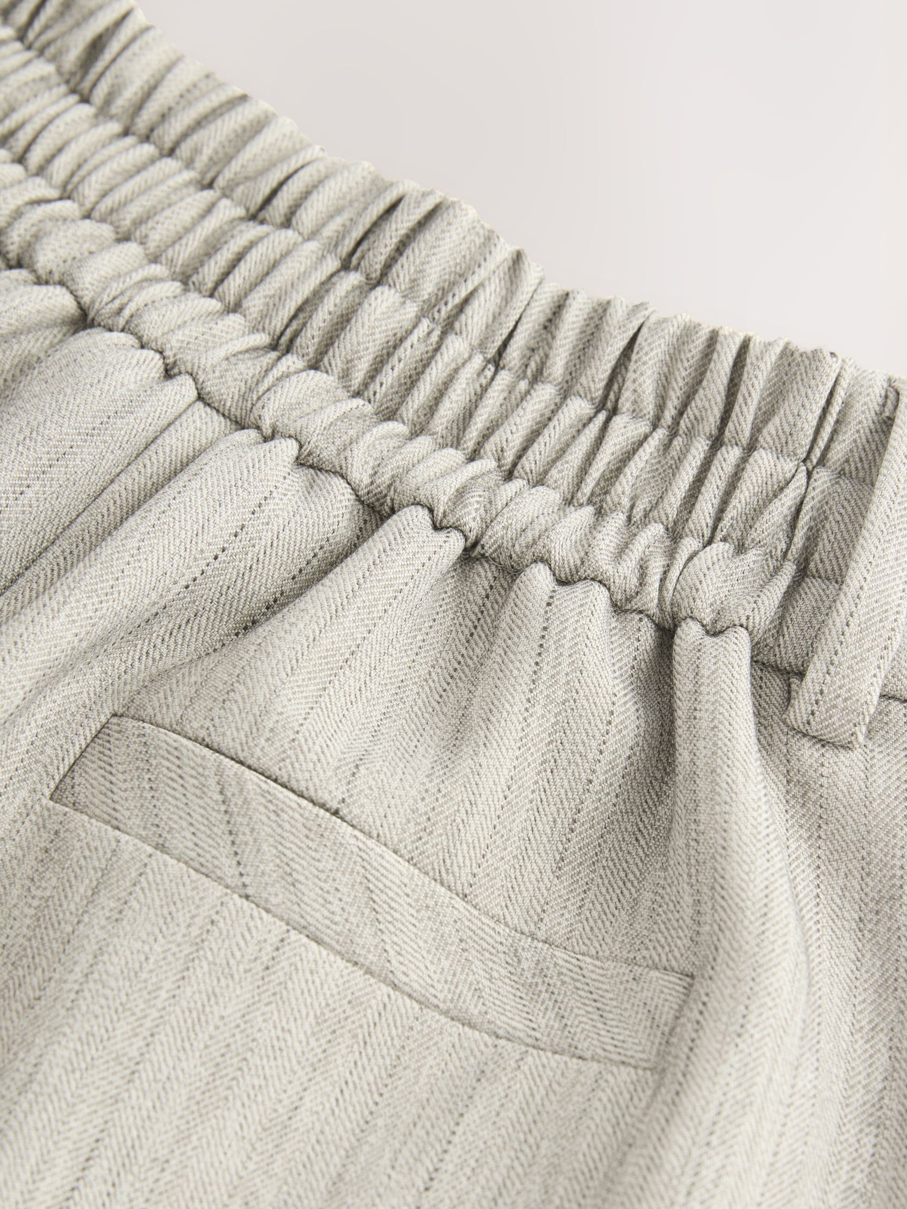 Buy Grey Herringbone Elastic Back Wide Leg Trousers from Next USA