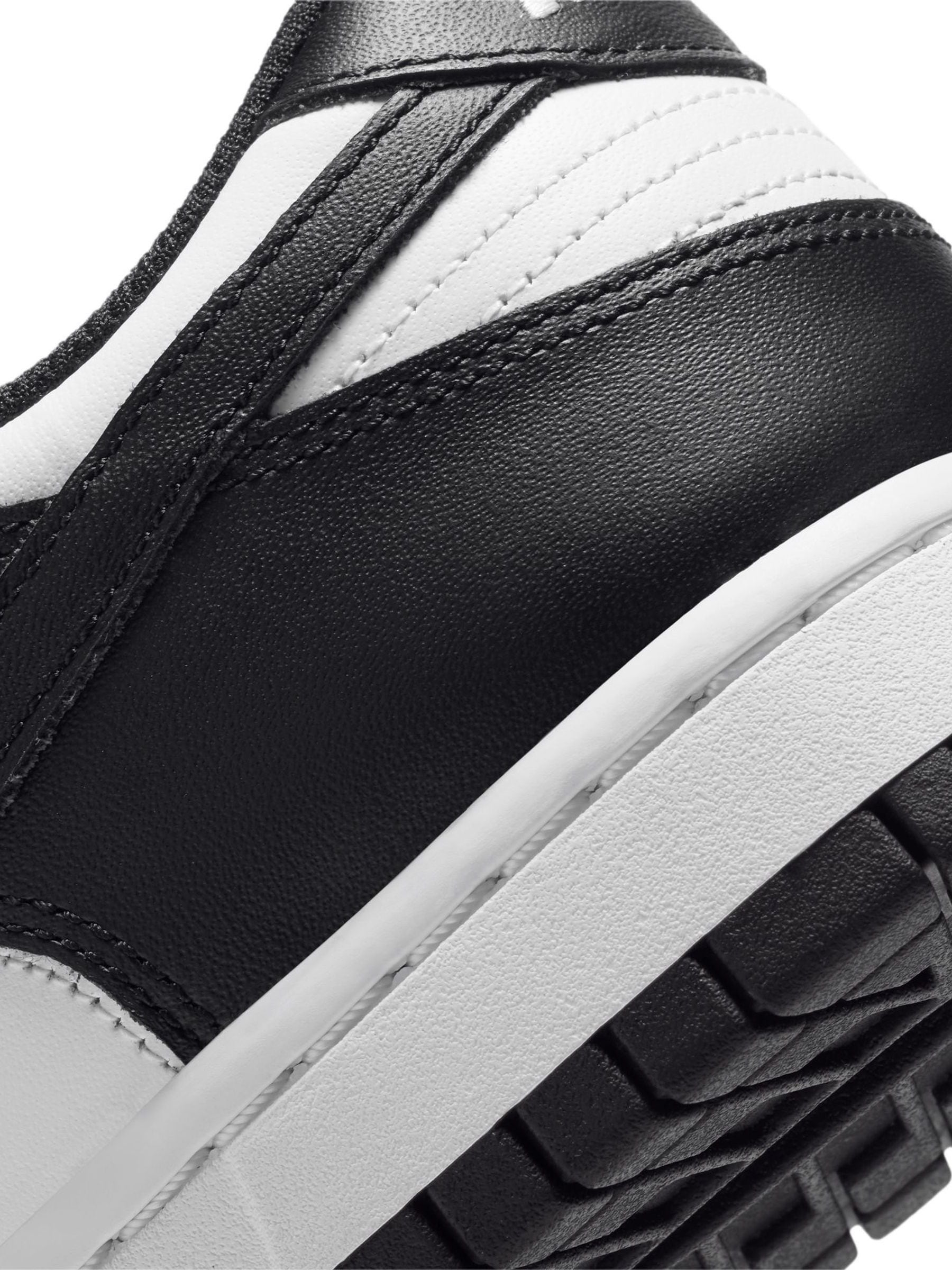 Przeglądaj Czarno-białe - Nike Dunk Low Trainers from Next