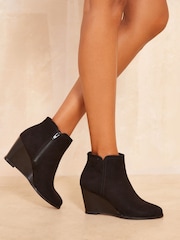Friends Like These Black Round Toe Faux Suede Wedge Heel Ankle Boots - Image 1 of 4