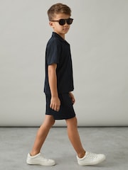 Reiss Navy Elio 3-9 yrs Wave Jacquard Cuban Collar Shirt - Image 1 of 5