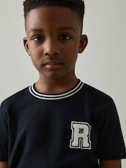 Reiss Navy Palmers 9-13 yrs Cotton Letter-Patch T-Shirt - Image 1 of 4