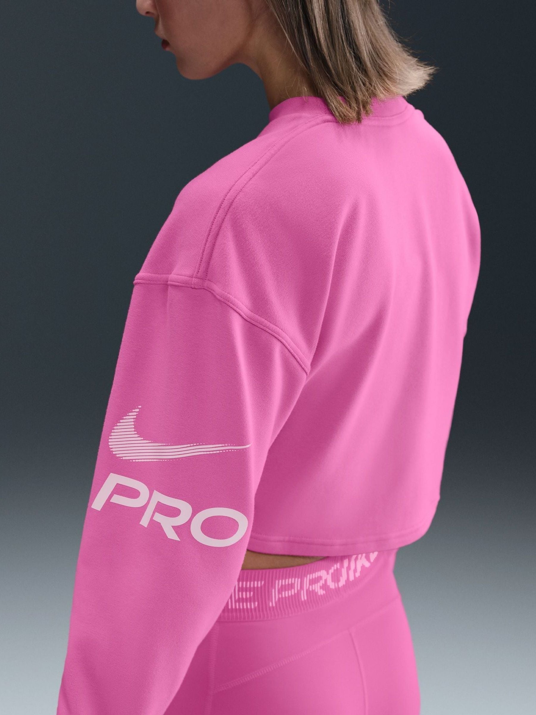 Buy Nike Red Pro Dri-FIT French Terry Crew Neck Sweatshirt from