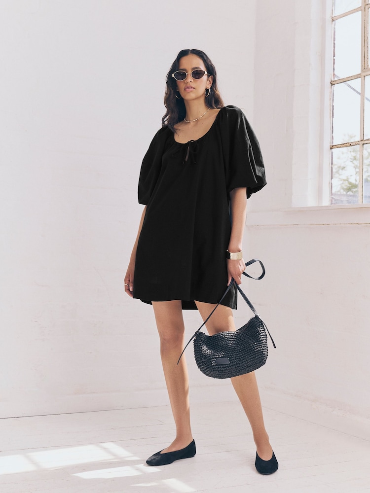 Black 100% Cotton Puff Sleeve Tie Front Mini Dress - Image 1 of 9 Black 100% Cotton Puff Sleeve Tie Front Mini Dress - Image 1 of 9