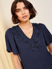 Friends Like These Navy Short Angel Sleeve 3D Floral Print Blouse - Image 1 of 4