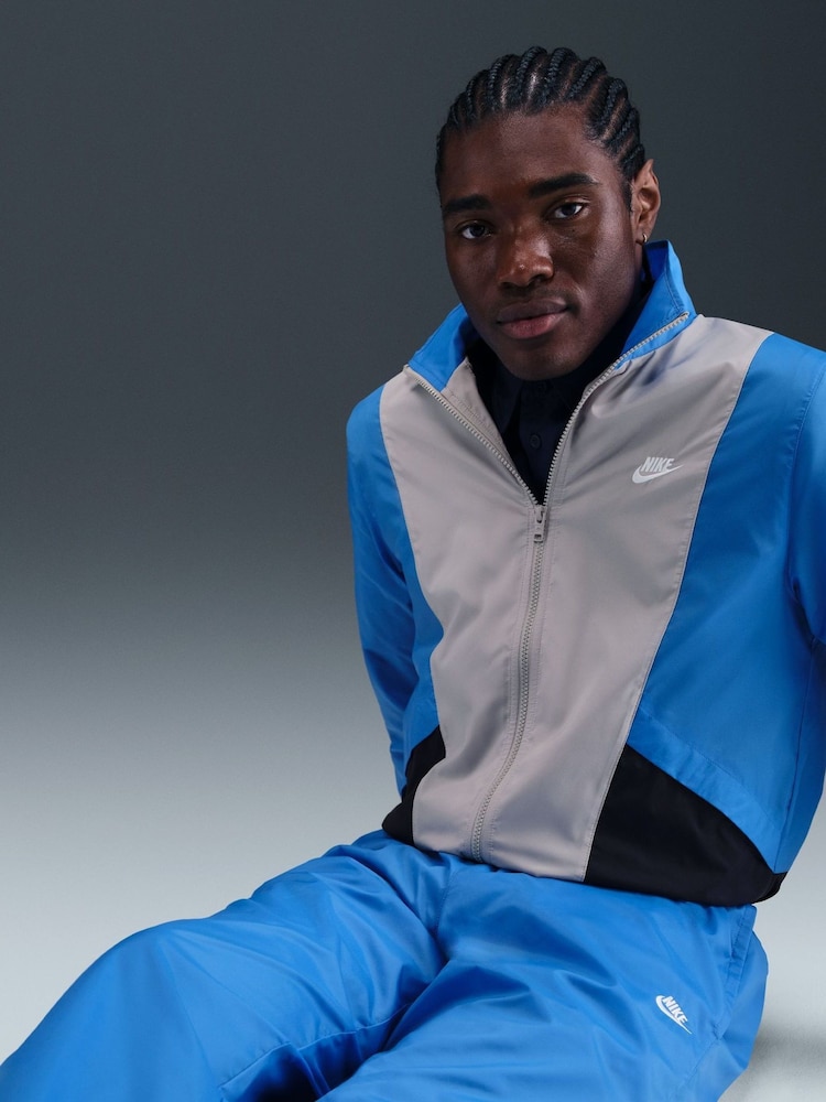 Buy Nike Photo Blue Club Woven Colour Block Tracksuit from Next