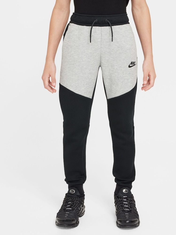 Nike Black Grey Tech Fleece Joggers - Image 1 of 3 Nike Black Grey Tech Fleece Joggers - Image 1 of 3