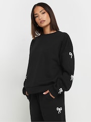 PixieGirl Petite Black Bow Detail Sweatshirt - Image 1 of 5