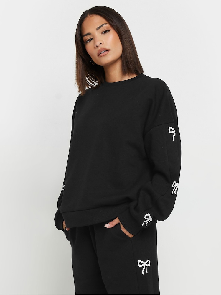 PixieGirl Petite Black Bow Detail Sweatshirt - Image 1 of 5